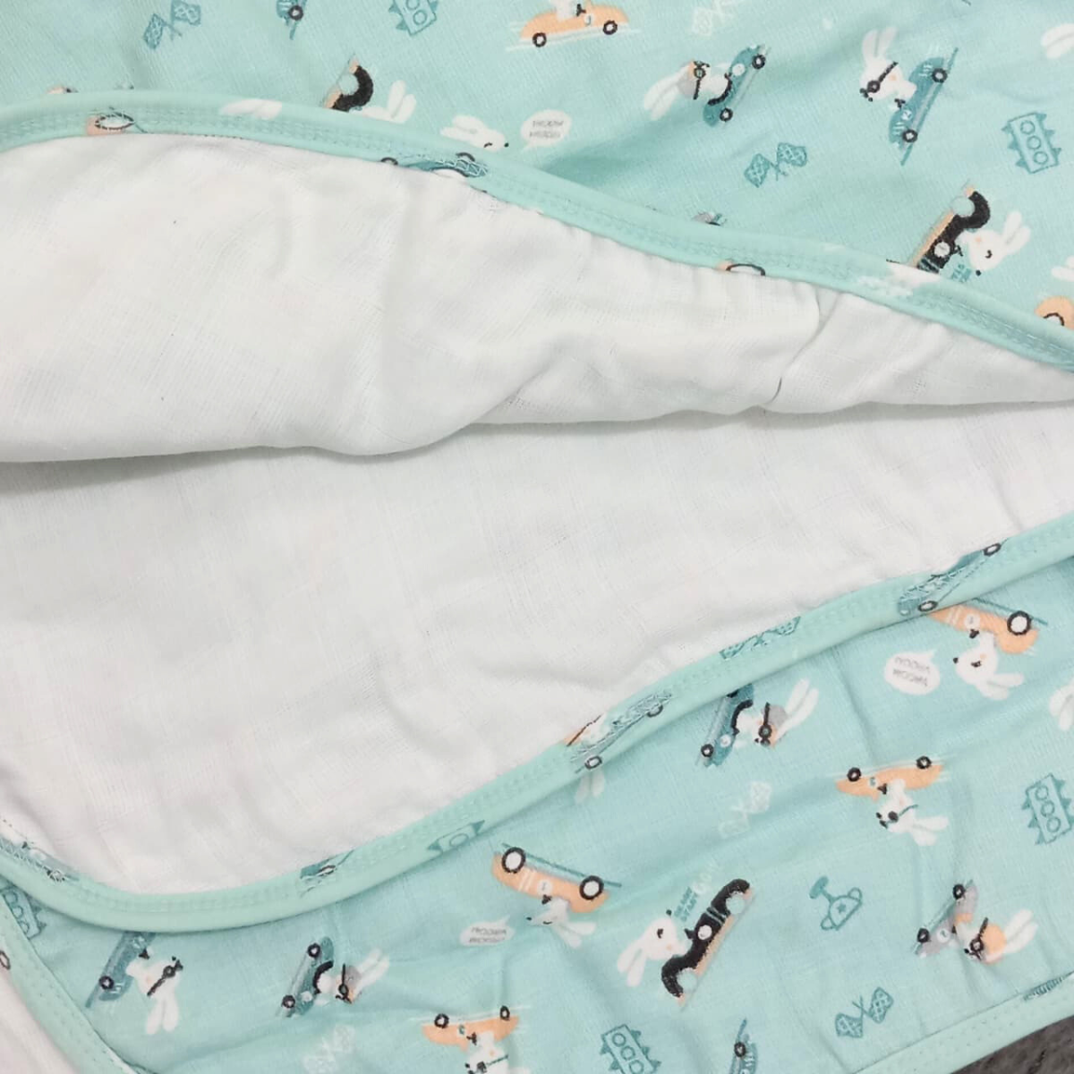 Riding Bunny Adventure: 6-Layered Muslin Swaddle Blanket for Soft and Cozy Comfort